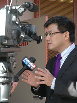 Controller John Chiang speaks to the media.